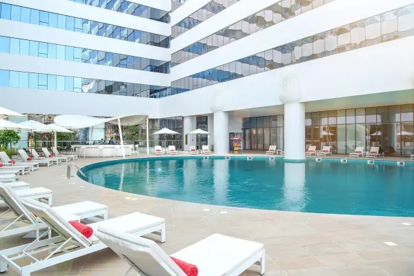 Al Jaddaf Rotana Suite Hotel 5*